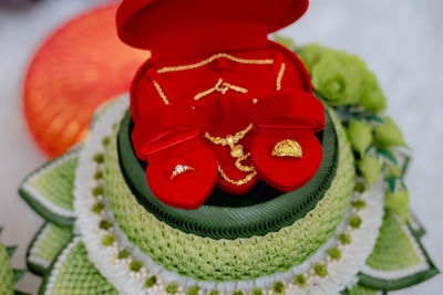 Close-up of wedding rings on table