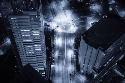 Aerial view of illuminated city at night