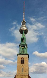 Low angle view of st mary church against fernsehturm