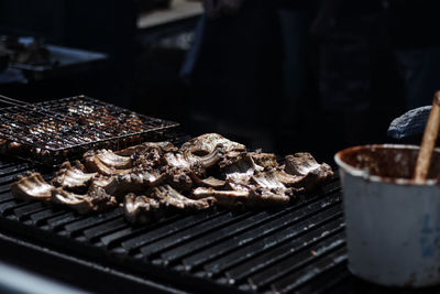 Close-up of meat on barbecue grill