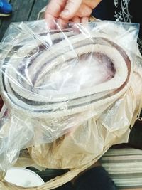 Close-up of man holding ice cream