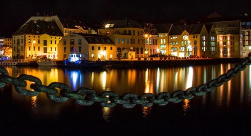 Illuminated cityscape at night