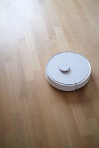 High angle view of technological equipment on hardwood floor