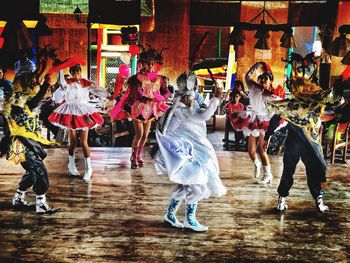 Group of people in traditional clothing during festival