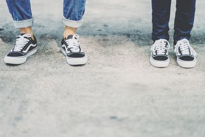 Low section of people standing on floor