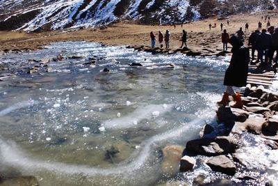 Group of people on rock