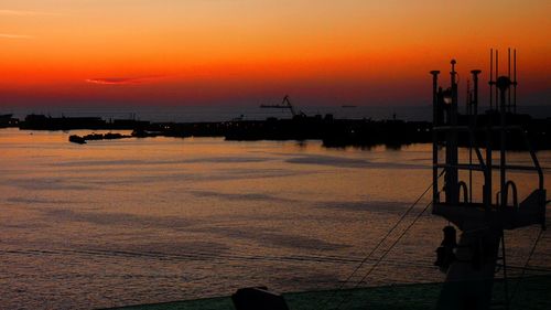 Scenic view of sea at sunset