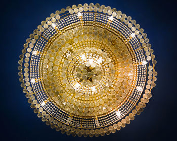 Low angle view of illuminated chandelier