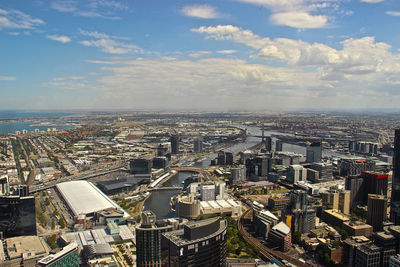 High angle view of modern buildings in city against sky