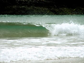 Sea waves splashing on shore