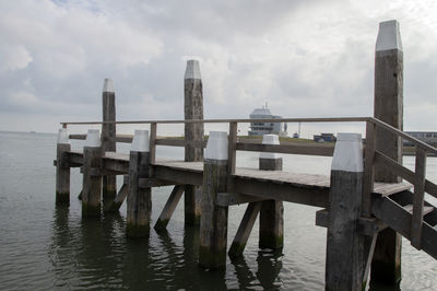 Pier on sea against sky