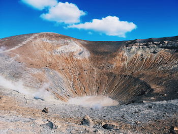 Scenic view of volcanic landscape against sky