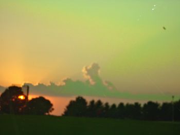 Scenic view of landscape at sunset