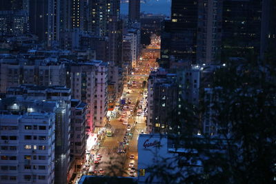 Illuminated buildings in city at night