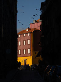 Sun in the end of a dark street in porto