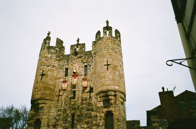 Low angle view of historic building against sky