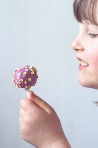 Midsection of child holding ice cream