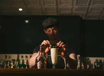 Portrait of a man drinking glass