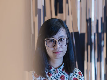 Portrait of a beautiful young woman at home