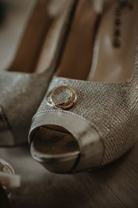 Close-up of shoes on table