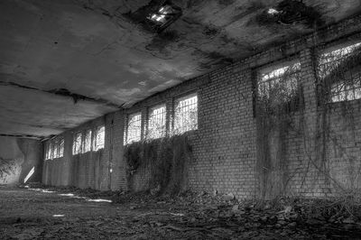 Low angle view of illuminated corridor