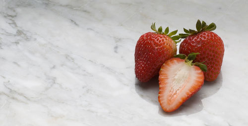 High angle view of strawberries on table