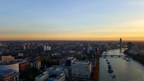 High angle view of city at sunset