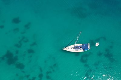 High angle view of sailboat sailing in sea