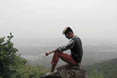 Hiker standing in forest