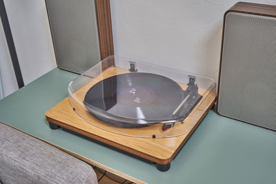 High angle view of piano on table