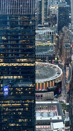 High angle view of illuminated buildings in city at night