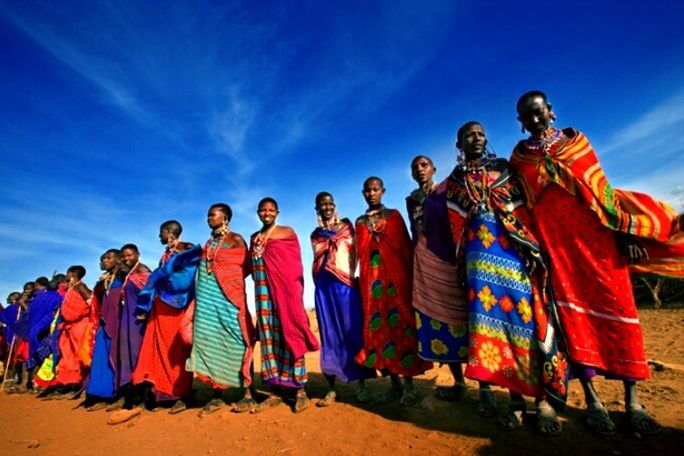 sky, multi colored, large group of people, low angle view, day, men, outdoors, adult, people, young adult, adults only