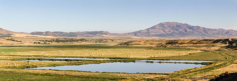 View of a field with mountain range in the background