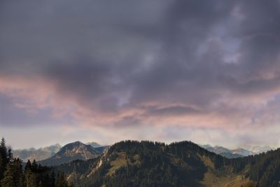 Scenic view of mountains against sky during sunset