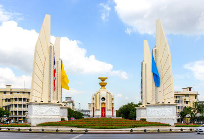 Thailand democracy monument building against cloudy sky