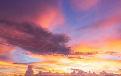 Low angle view of dramatic sky during sunset
