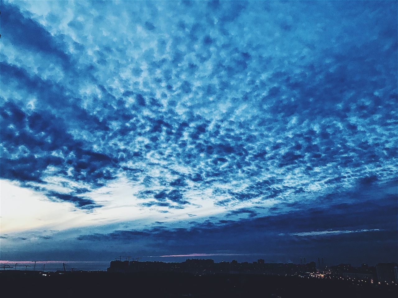 VIEW OF DRAMATIC SKY OVER CITY