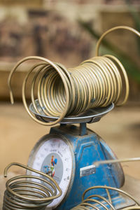 Close-up coiled metal on weight scale