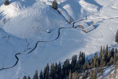 Snow covered land and mountains