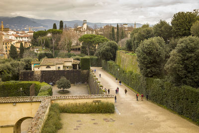 High angle view of trees and buildings against sky