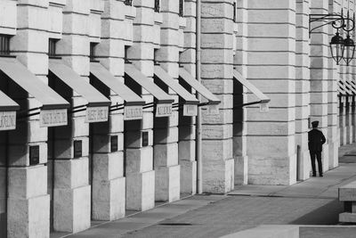 Rear view of man walking on street