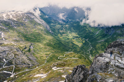 High angle view of rocks and mountains against sky