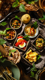 Assorted traditional indonesian meat and vegetable dishes from several regions in the country
