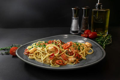 Close-up of food served on table