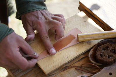 Cropped image of carpenter using hand tool