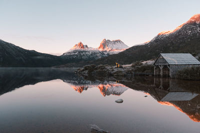 Scenic view of lake against sky during sunset