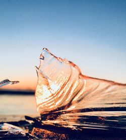 Close-up of water against clear blue sky