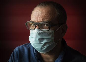 Male doctor in medical mask close-up face