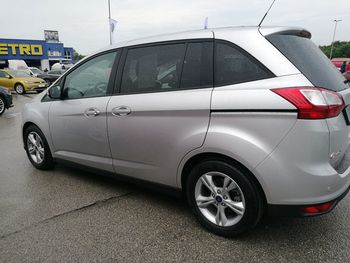 Side view of car parked on road