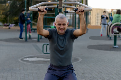 Mature man working out in the gym and leading a healthy and active lifestyle.